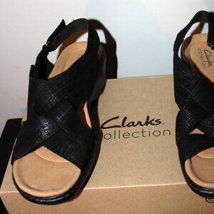 Clarks sandals, black material, velcro back strap
